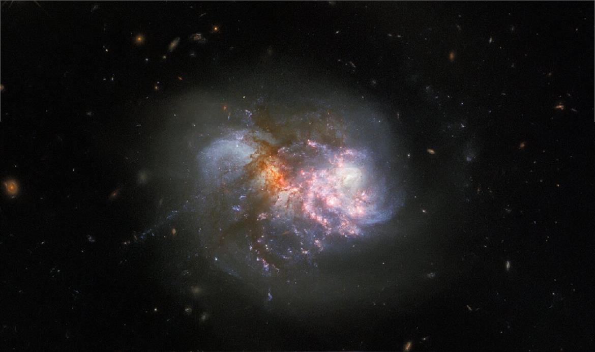 NASA's Space Telescope Captures Galaxies Colliding In A Dramatic Cosmic Merger