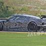 Next-Gen Mid-Engine Chevy Corvette Spied In Sinister C8.R Guise Lapping Road America
